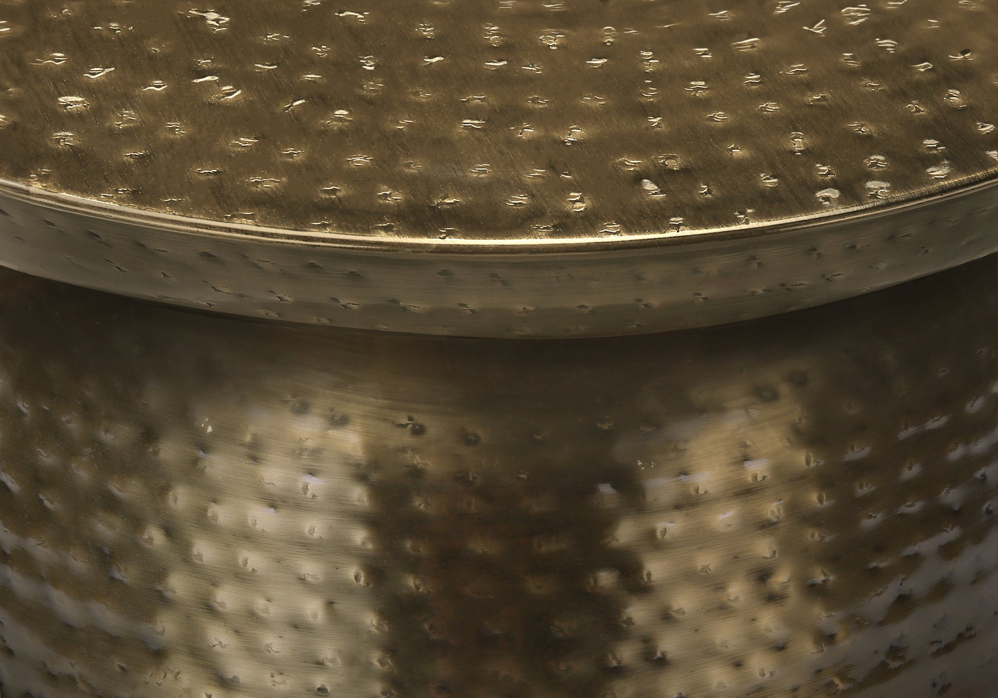 Hammered brass accent table with textured metallic finish ideal for living room decor