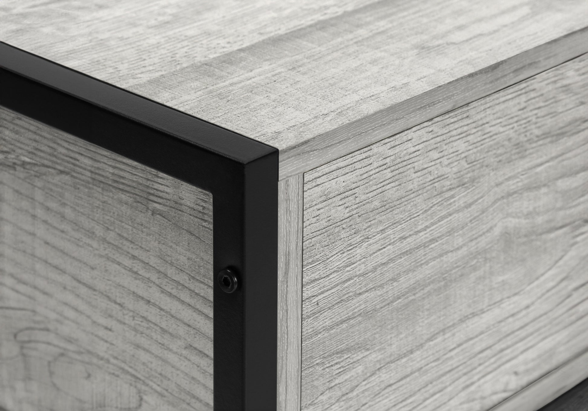 Weathered grey wood cabinet with black metal trim detail