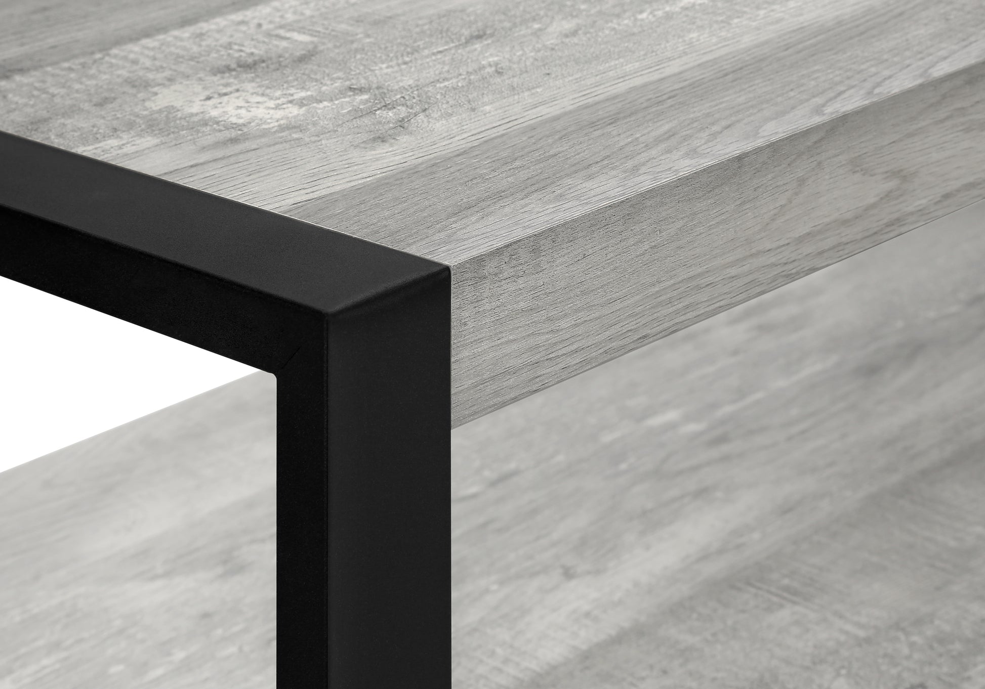 Modern gray wood grain coffee table with black metal frame accent
