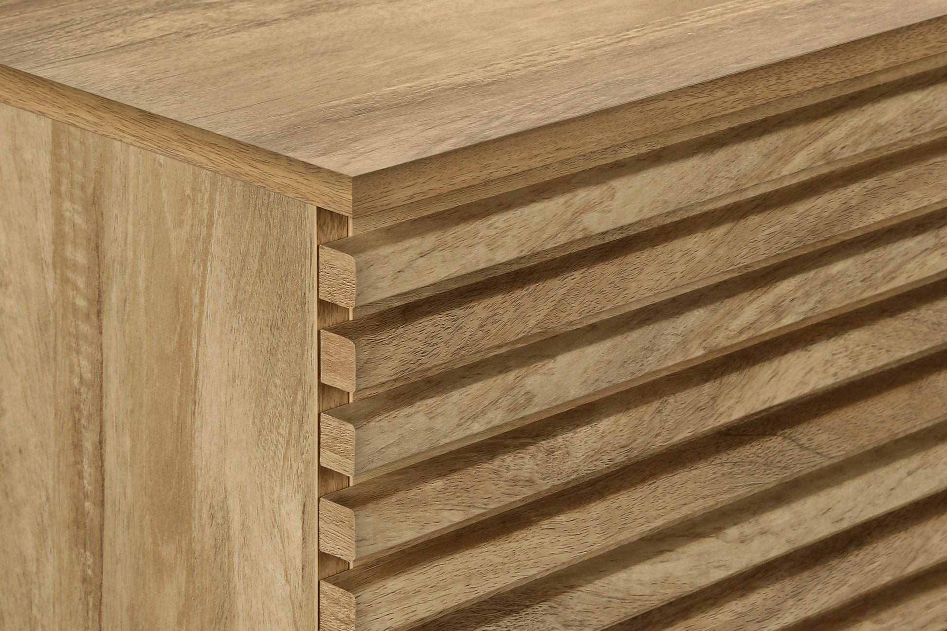 Light brown wood cabinet with slatted drawer fronts modern design