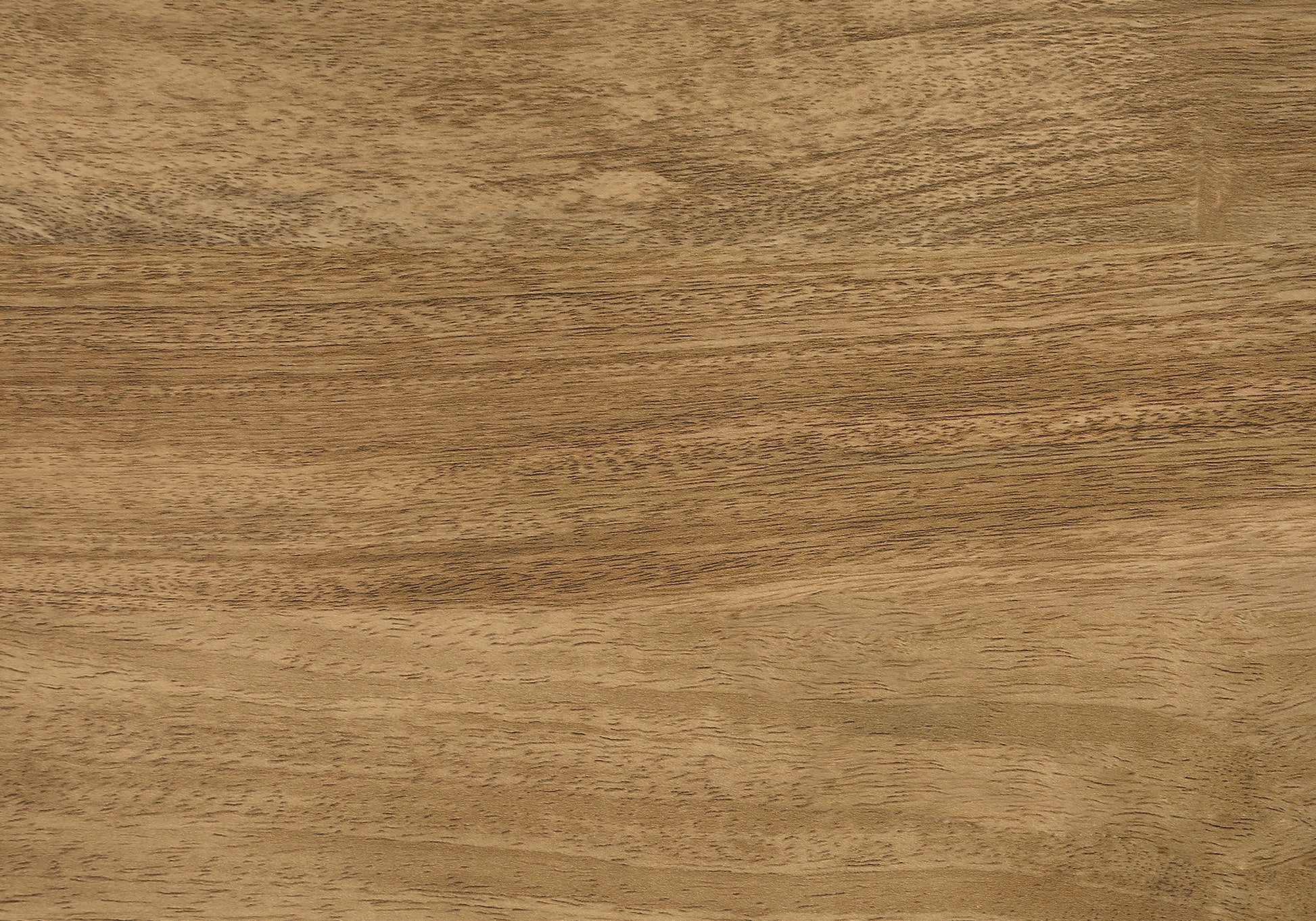 Closeup of natural walnut wood grain texture with warm brown tones
