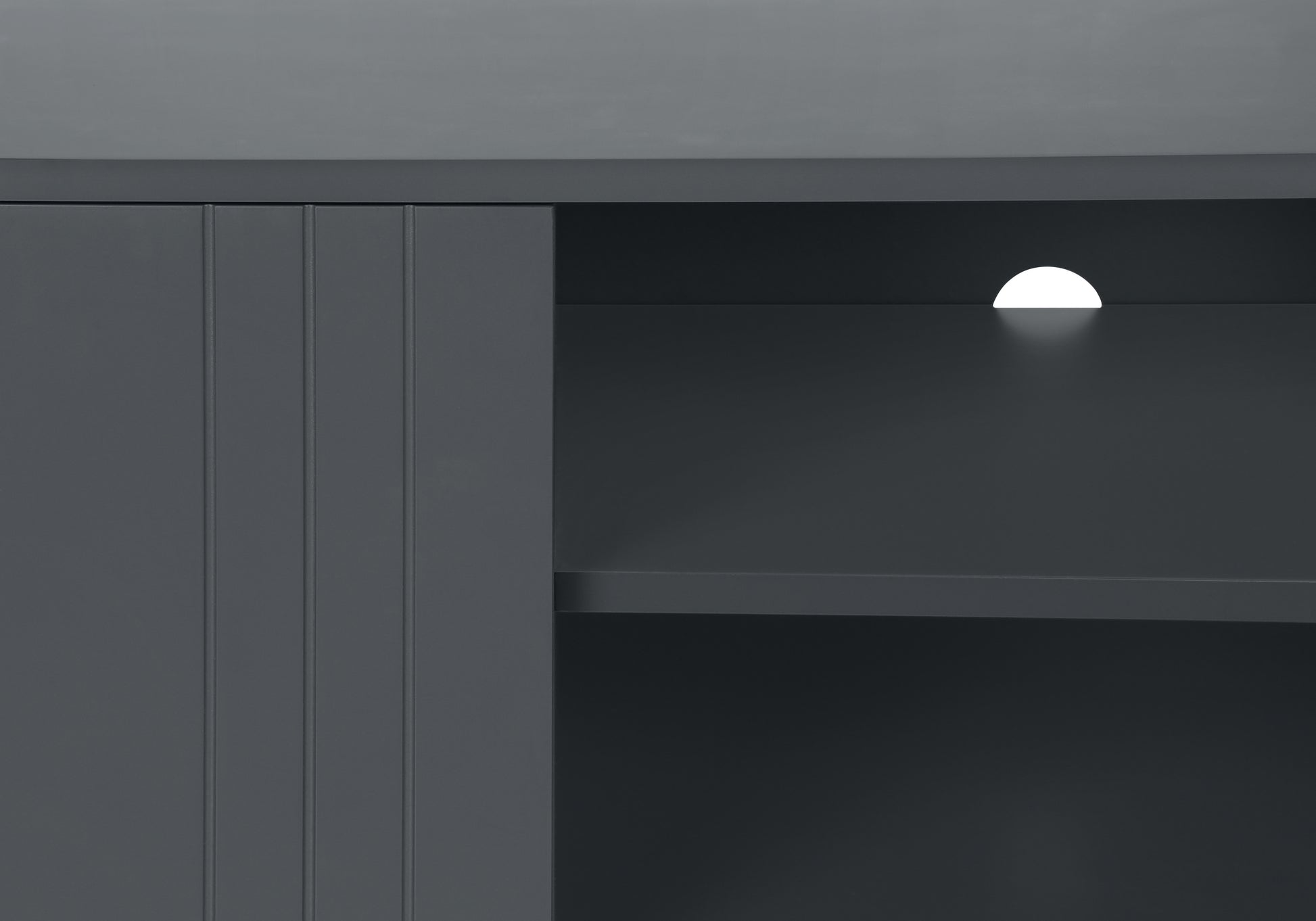 Dark grey modern cabinet with fluted door detail ideal for living room storage