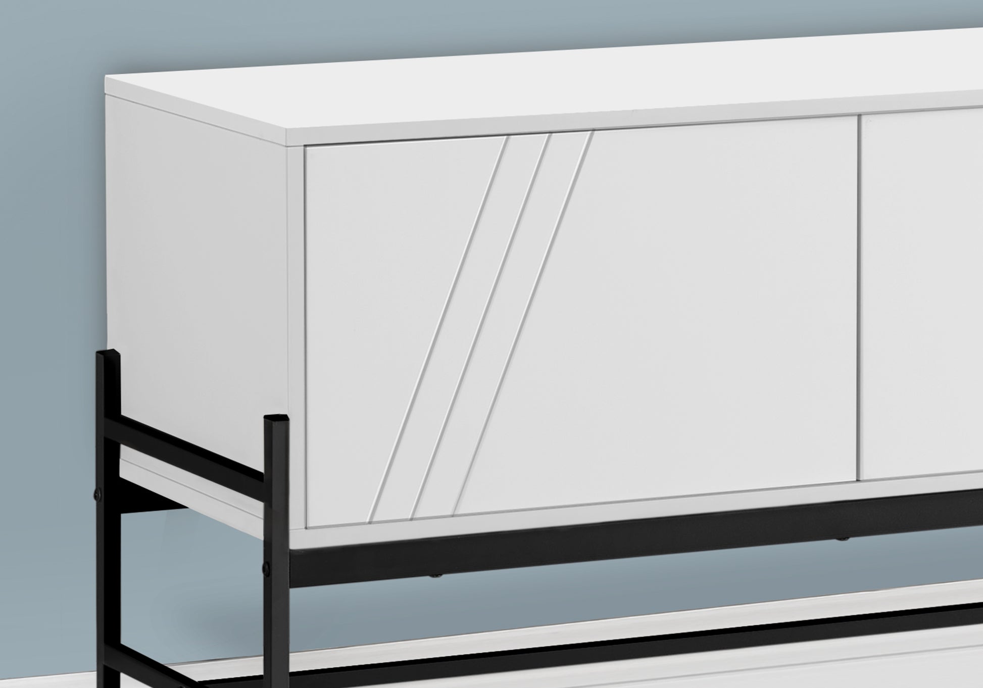 White modern sideboard with fluted door detail and black metal legs