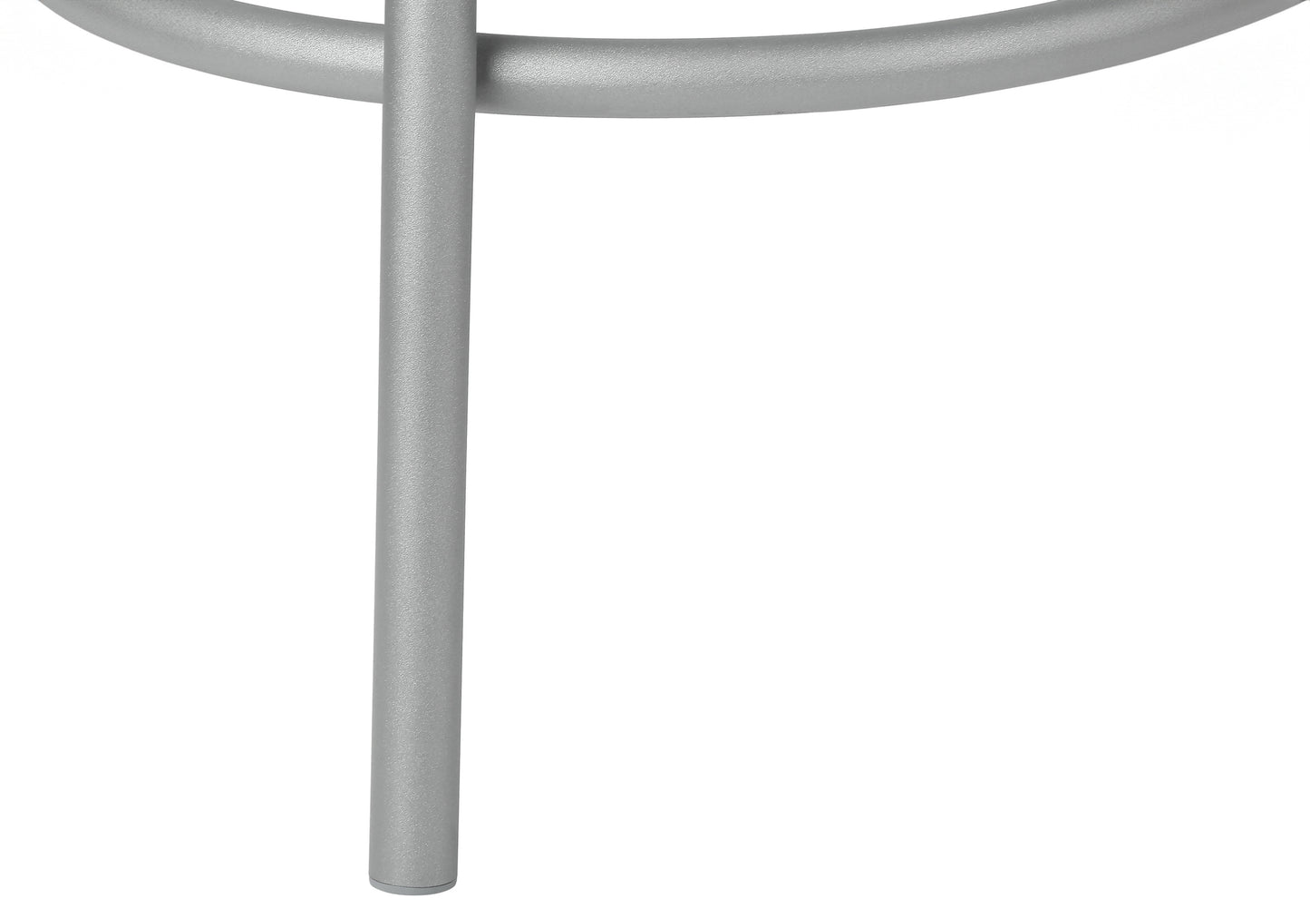 Close up of sleek silver metal desk legs for a modern office setup