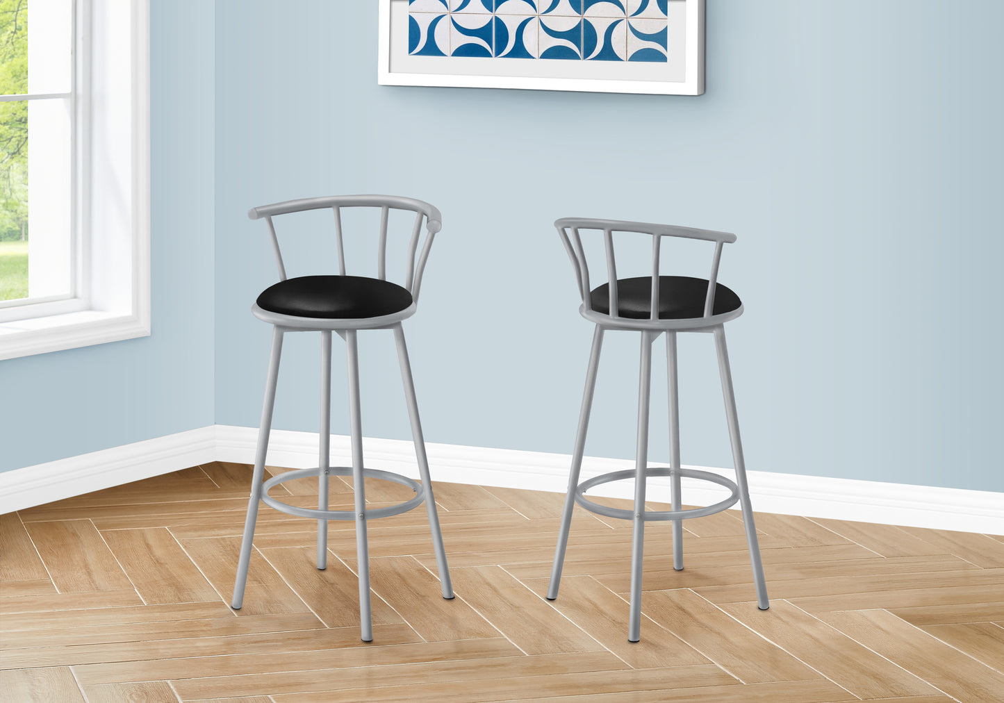Two modern gray bar stools with black cushioned seats perfect for a kitchen island