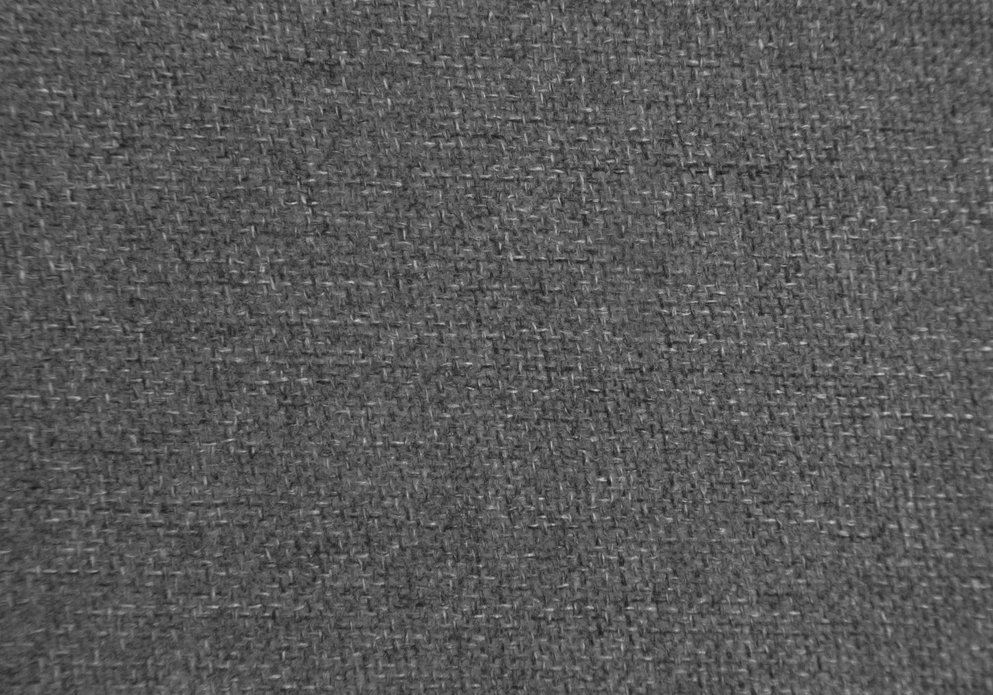 Closeup of a textured dark grey linen fabric with a visible weave pattern perfect for upholstery