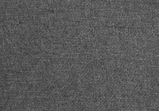 Closeup of a textured dark grey linen fabric with a visible weave pattern perfect for upholstery