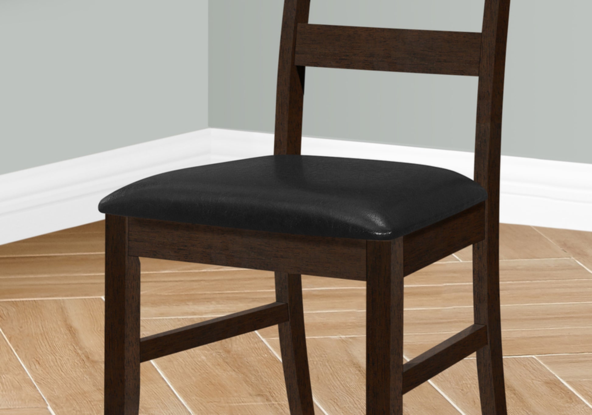 Dark wood counter stool with a black faux leather seat perfect for modern kitchens
