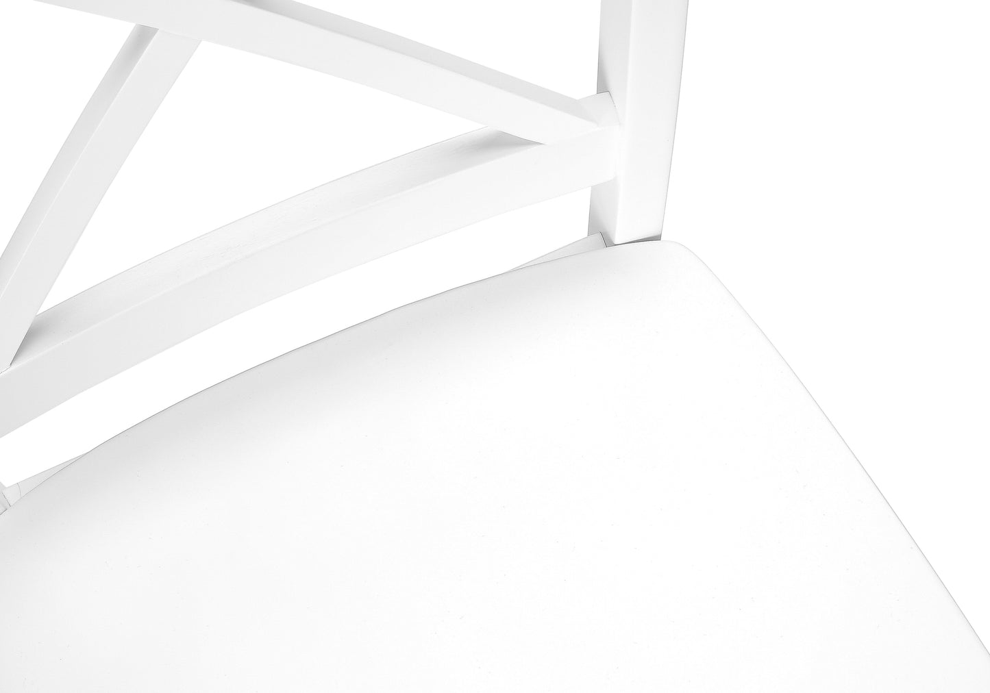 Closeup of a white wooden chair with a crossback design showcasing seat detail