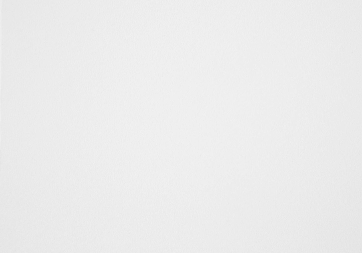 Closeup of textured white paper ideal for watercolor painting