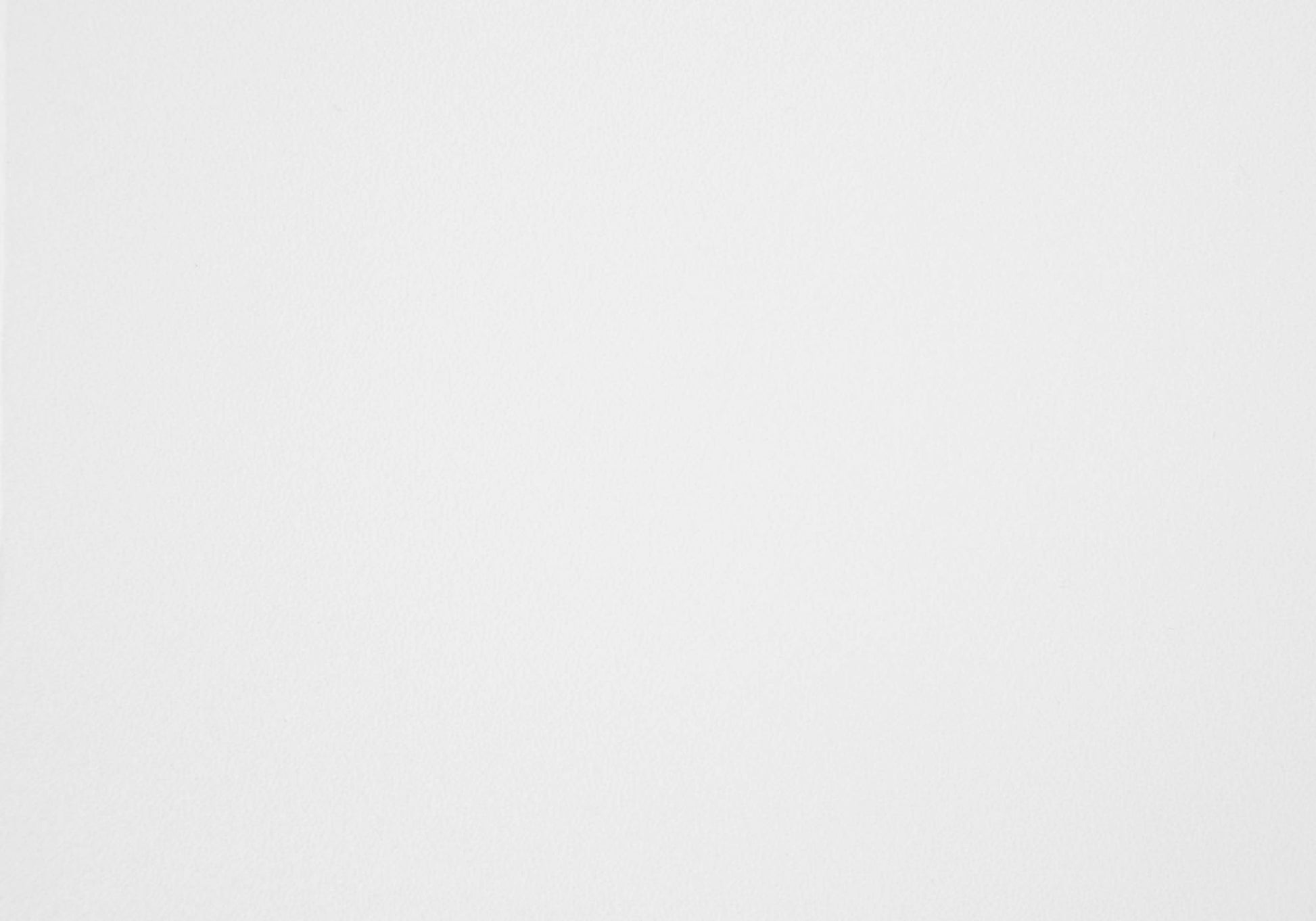 Closeup of textured white paper ideal for watercolor painting