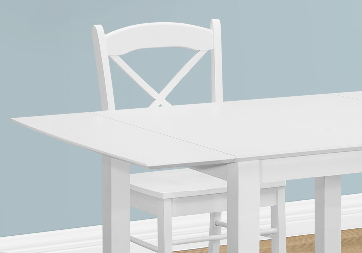 White drop leaf dining table with matching Xback chair
