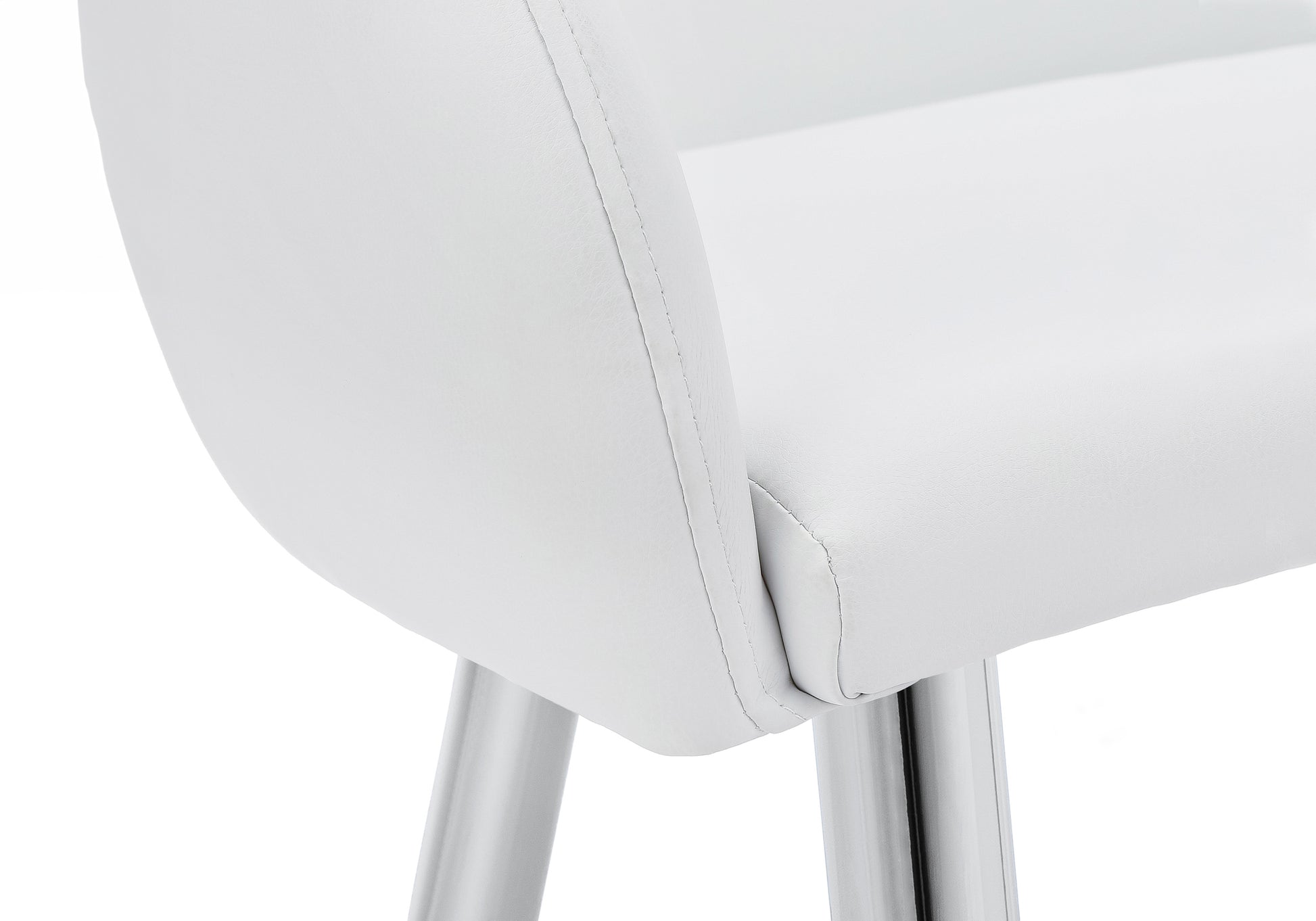 Closeup of a white faux leather bar stool seat with chrome legs