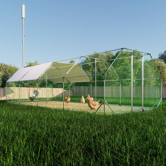 Large metal and mesh chicken coop with white roof and chickens