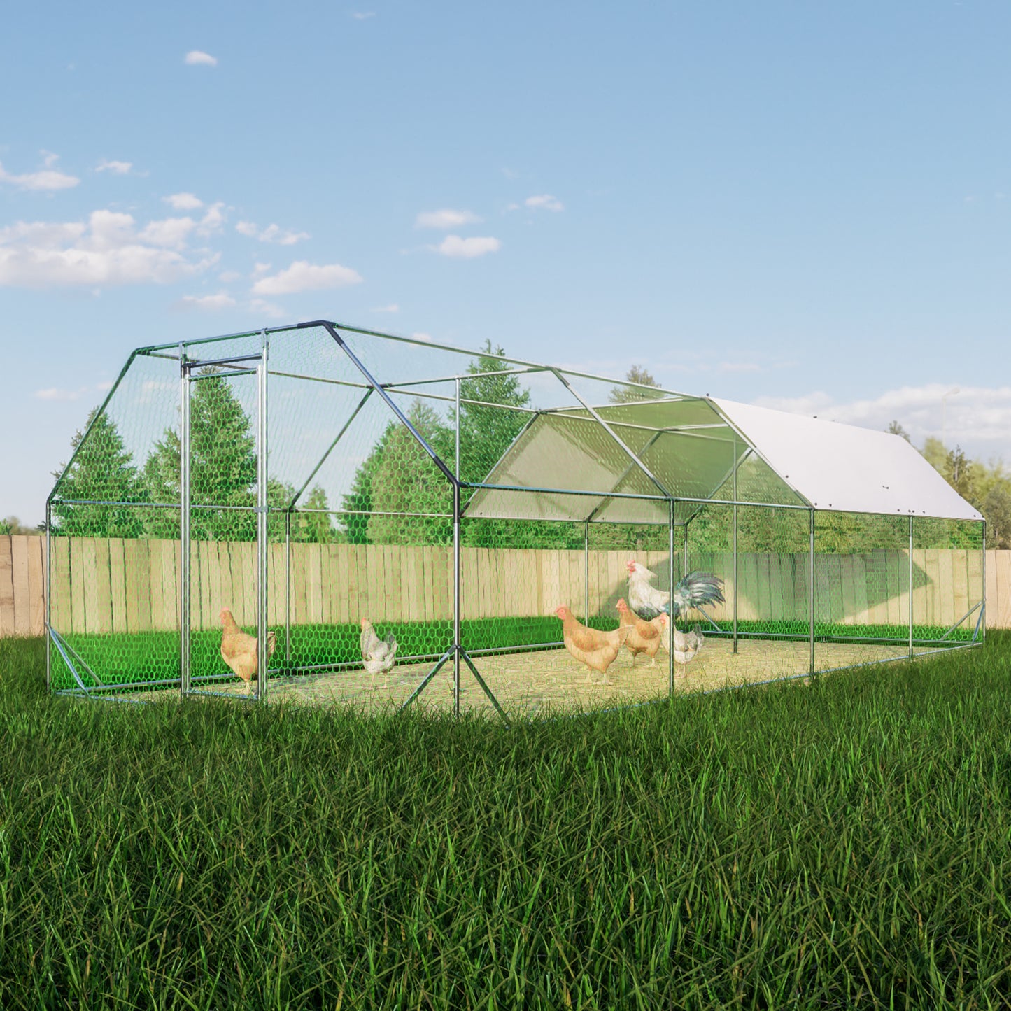 Large metal chicken coop with green mesh fencing and a white roof in a grassy field