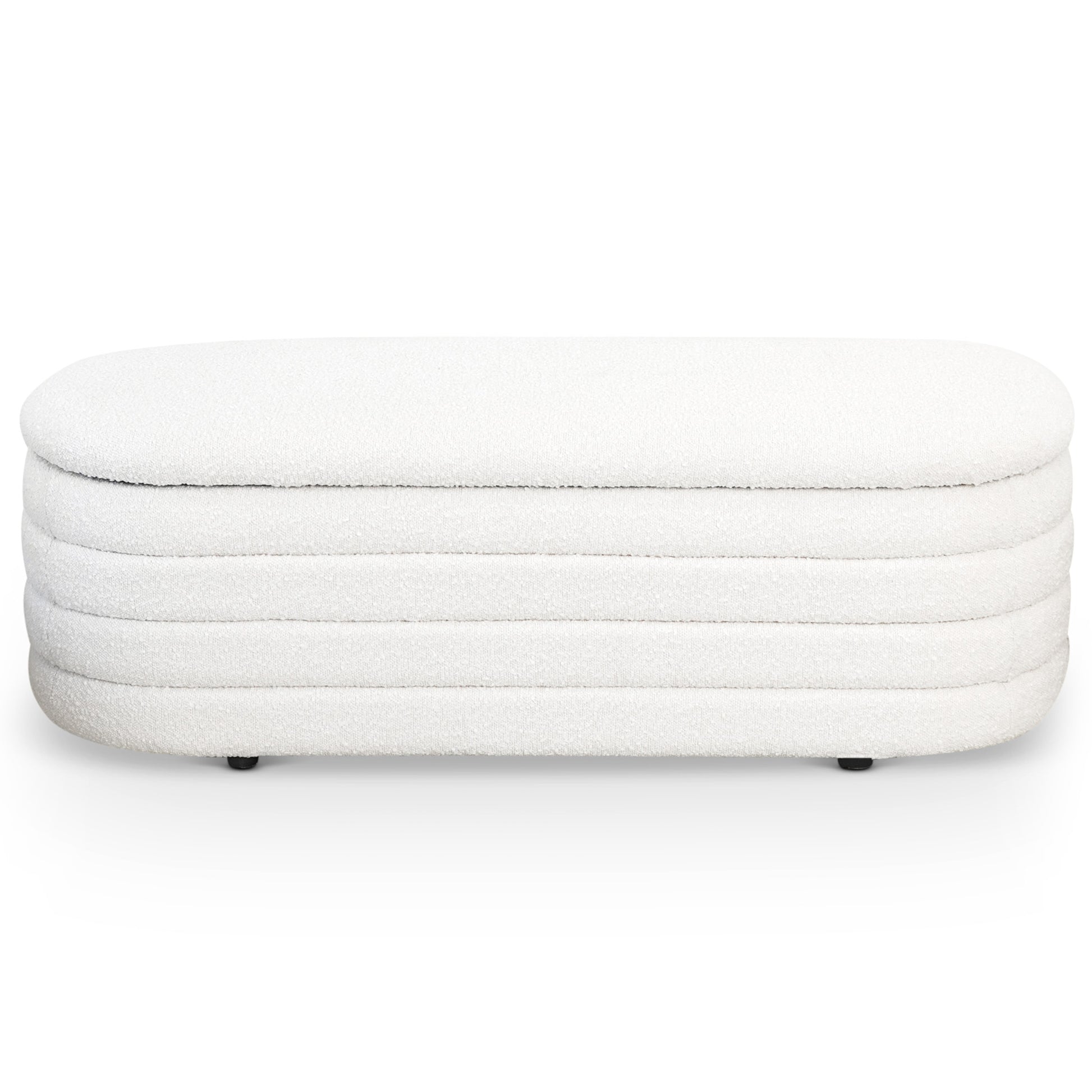 White boucle fabric storage bench with fluted side detail and rounded corners