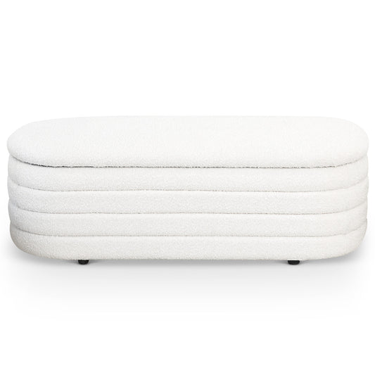 White boucle fabric storage bench with fluted side detail and rounded corners