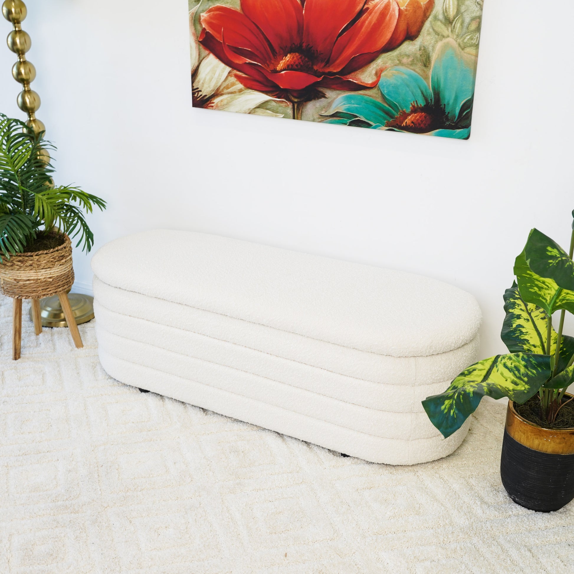 Textured cream storage ottoman with ribbed detailing perfect for entryway seating