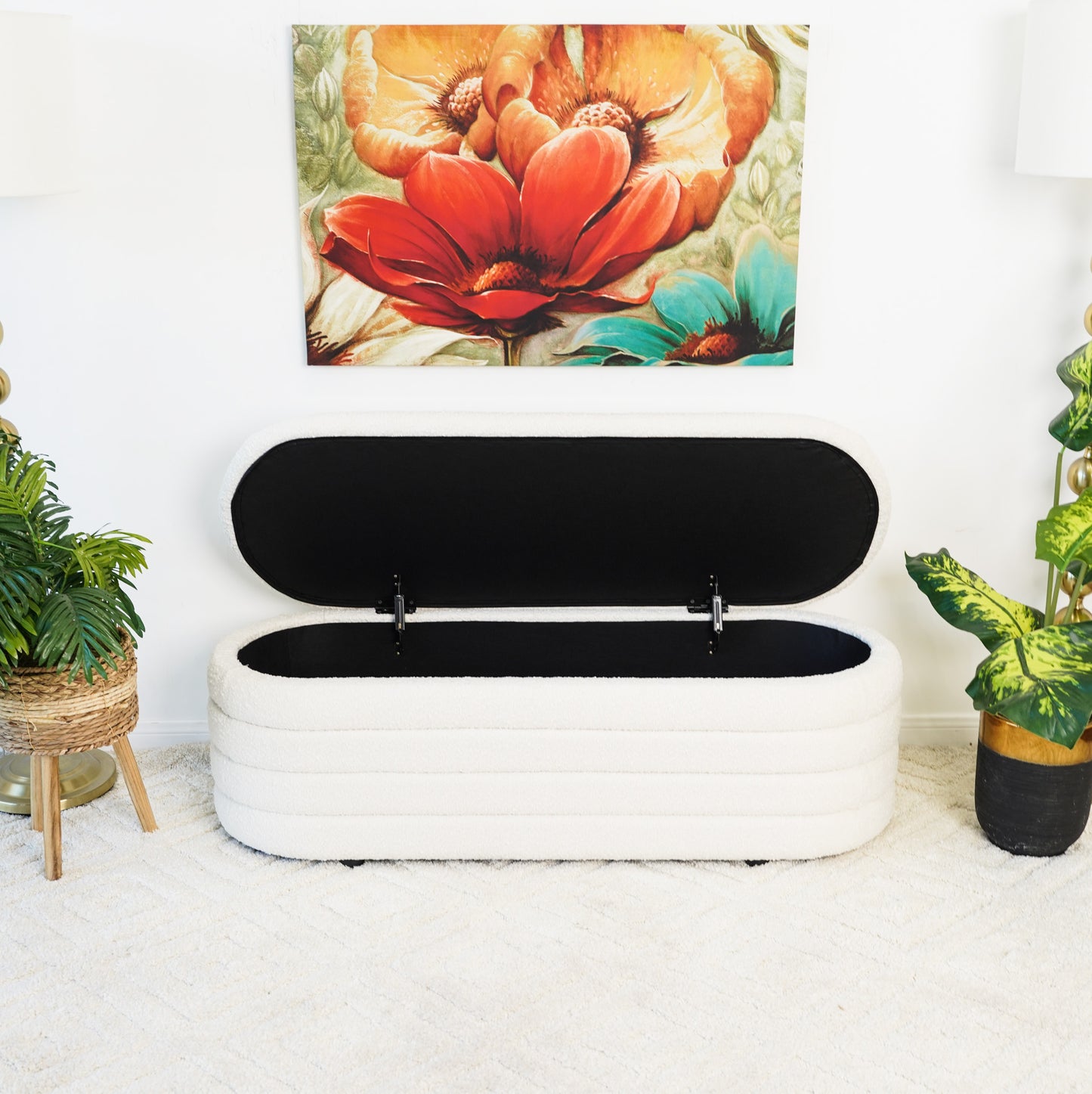 Open white textured storage ottoman with black interior side view