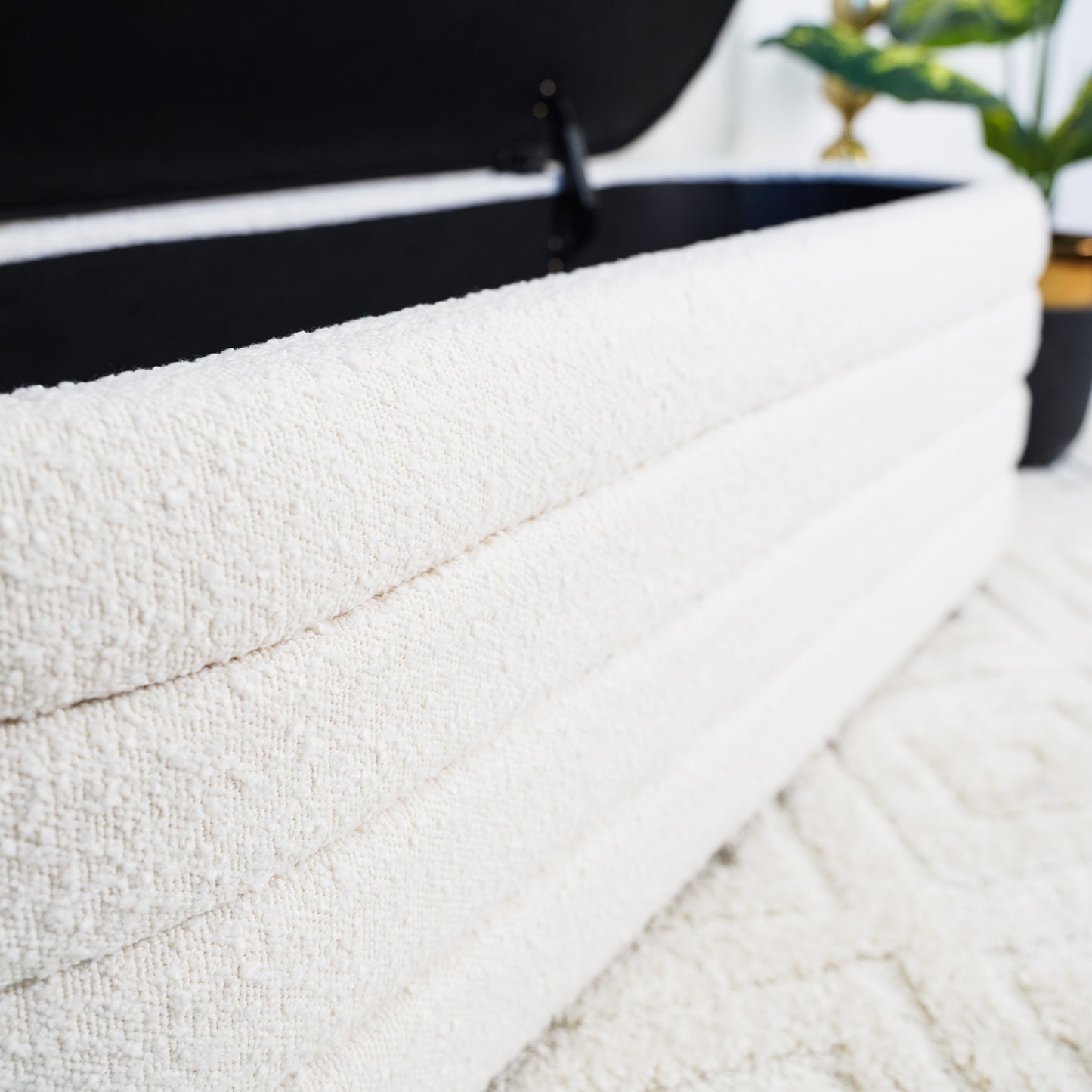 Textured cream linen storage ottoman with plush interior perfect for living rooms