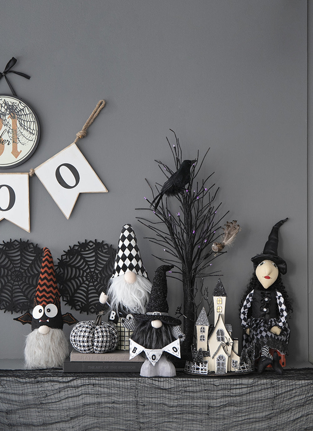 Spooky Halloween gnome with orange chevron hat and googly eyes ideal for seasonal decor
