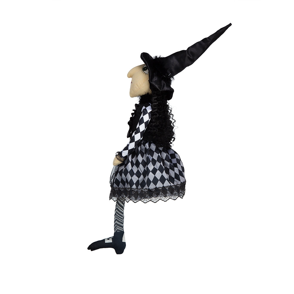 Whimsical fabric witch doll with black diamond dress and striped stocking