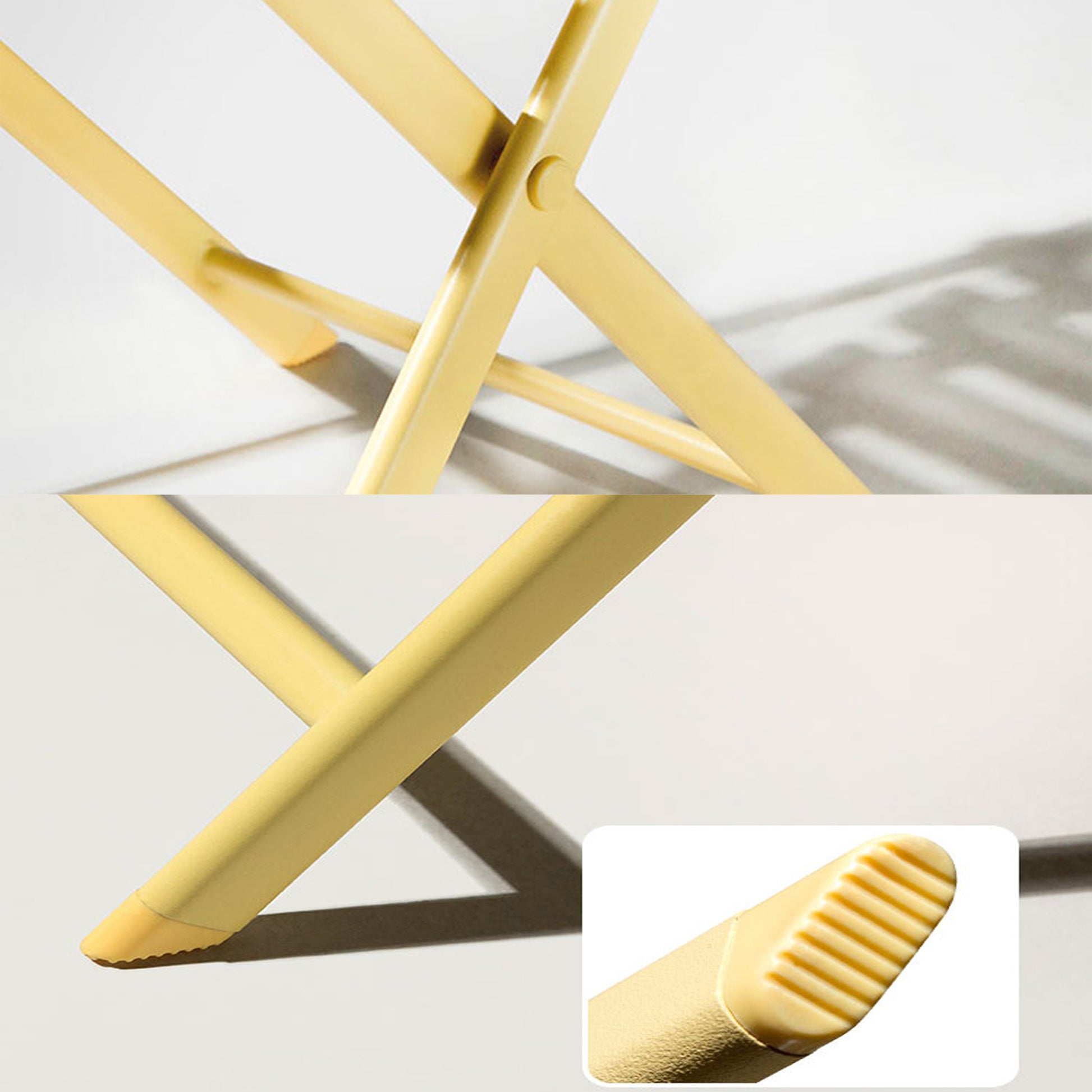 Closeup of yellow metal folding stool legs with visible joint detail