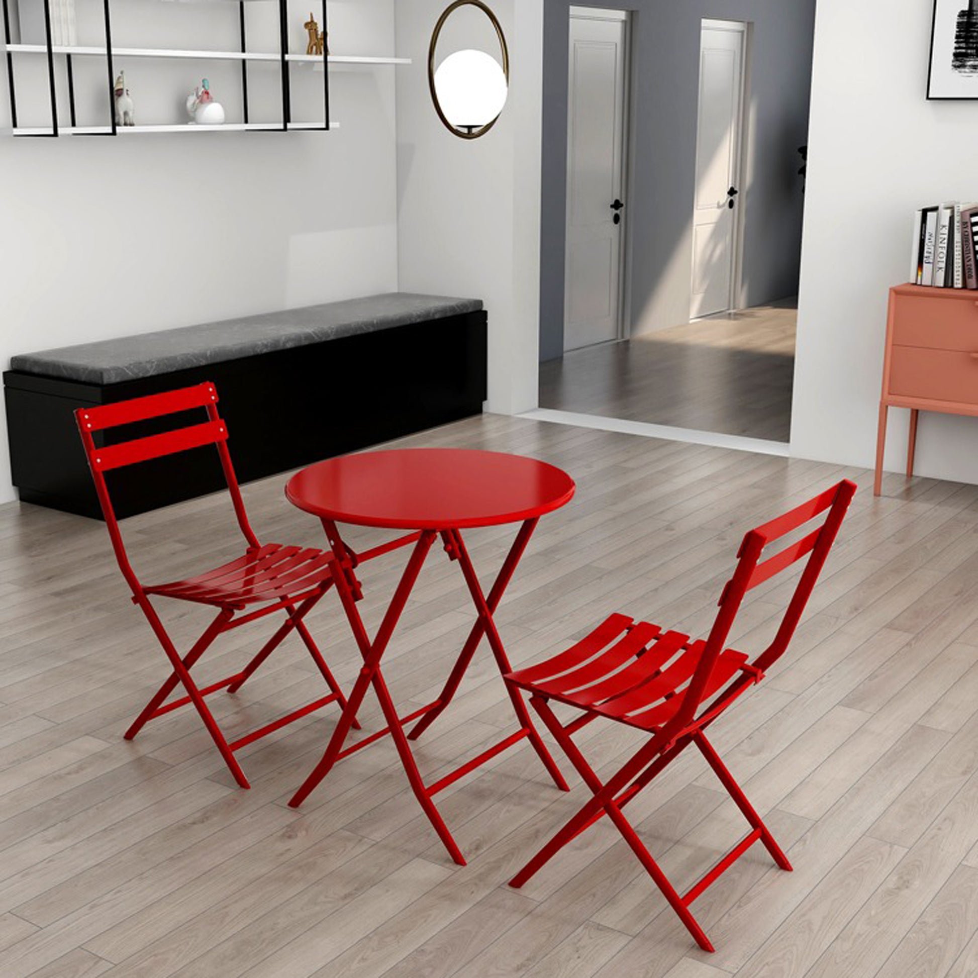 Red metal bistro set with round table and slatted chairs for patio use