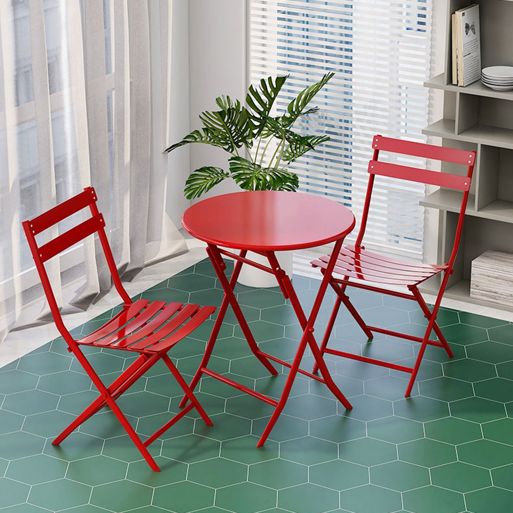 Red folding bistro set with two chairs and round table perfect for small patios