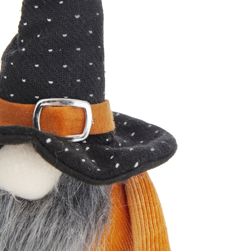 Black polka dot witch hat gnome with orange accents and silver buckle detail