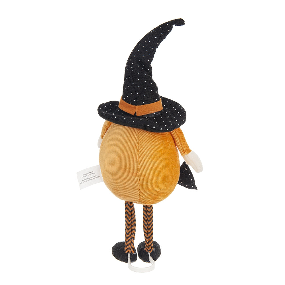 Orange corduroy pumpkin plush with a black polka dot witch hat perfect for Halloween decor