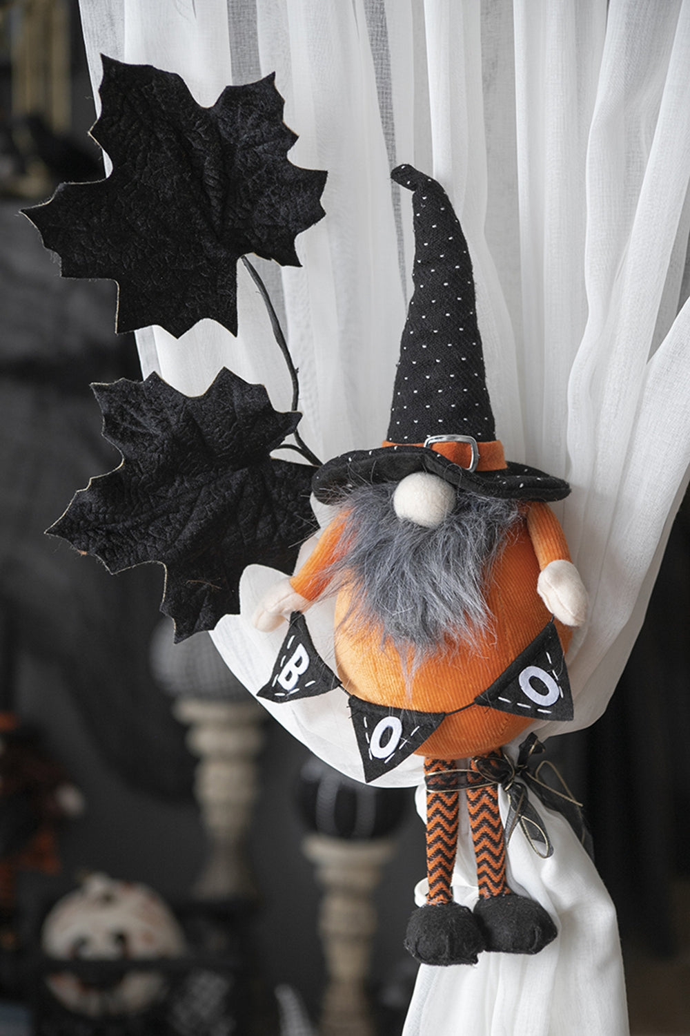 Halloween gnome decoration with orange body grey beard and BOO banner