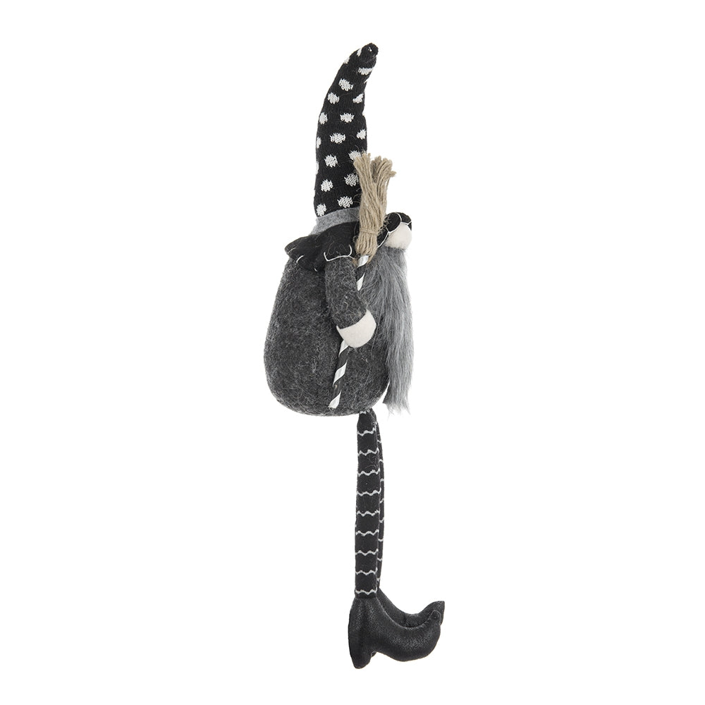 Gray plush gnome with black polka dot hat and broom for Halloween decor