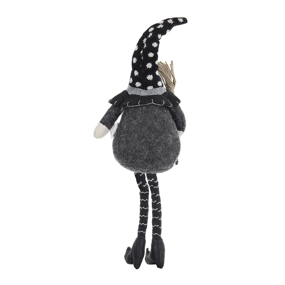 Black polka dot witch hat plush gnome with broom and striped legs