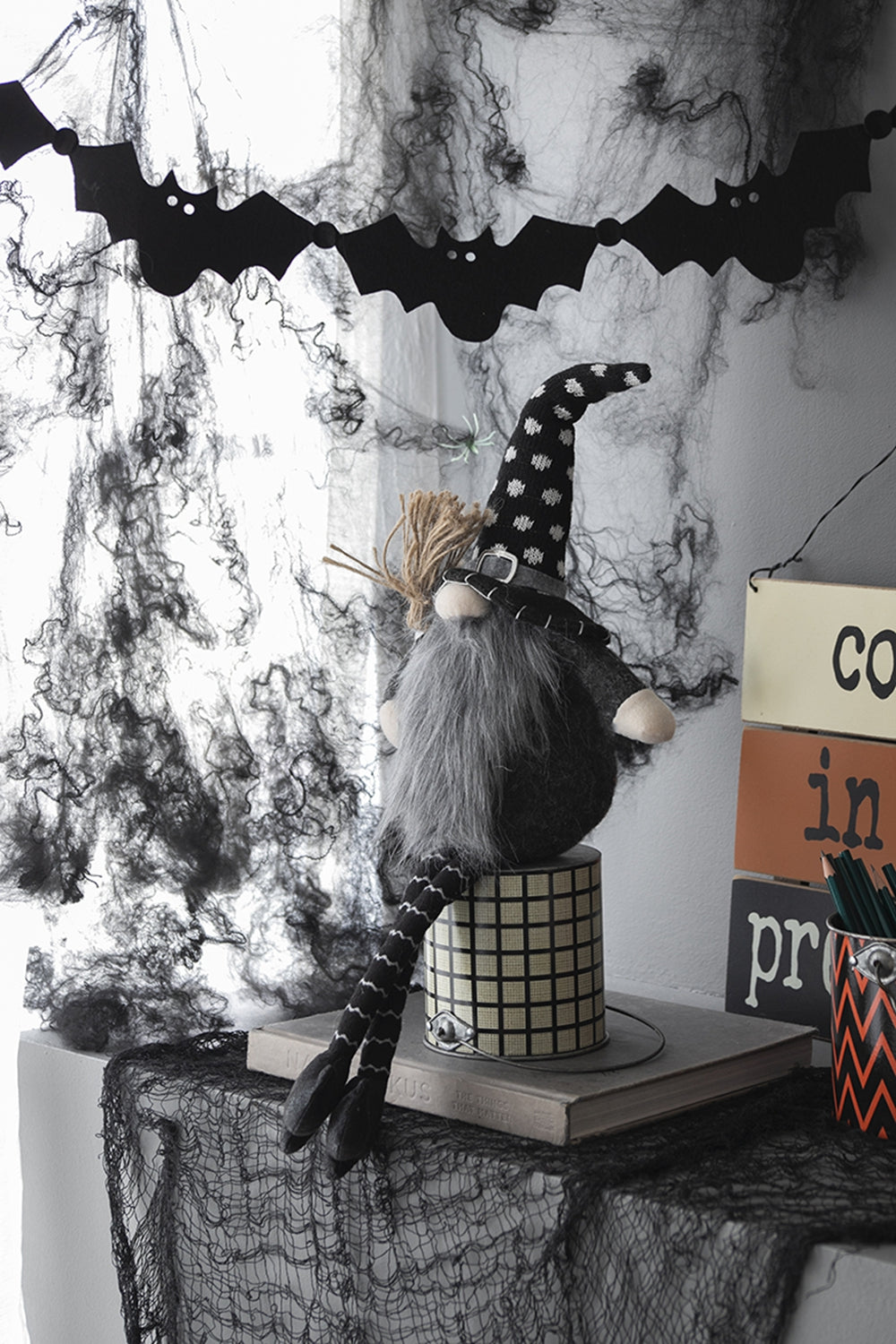 Spooky Halloween gnome with gray beard and polka dot hat perfect for holiday decor