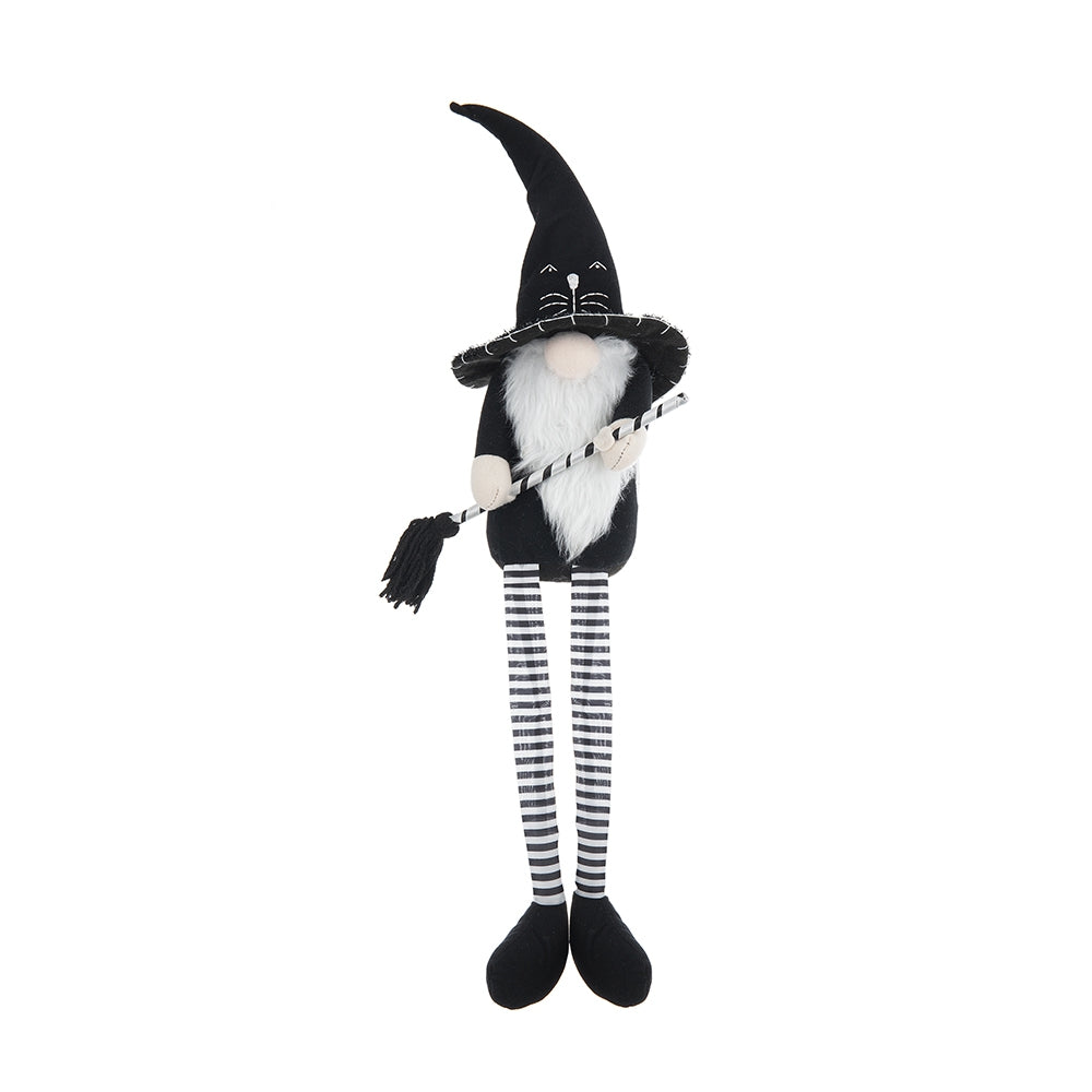 Black and white witch gnome with broom festive holiday decor