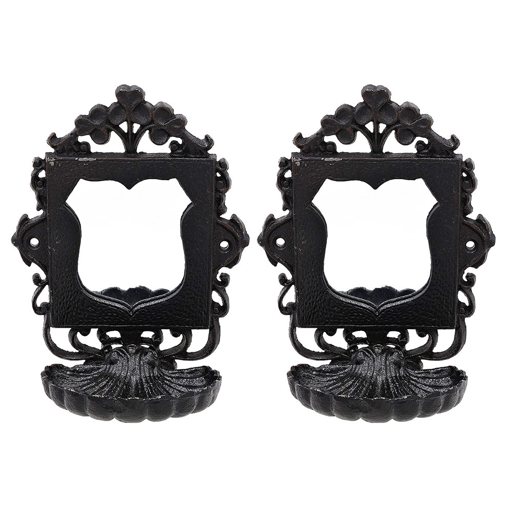 Pair of black ornate cast iron wall hooks with shell base antique style