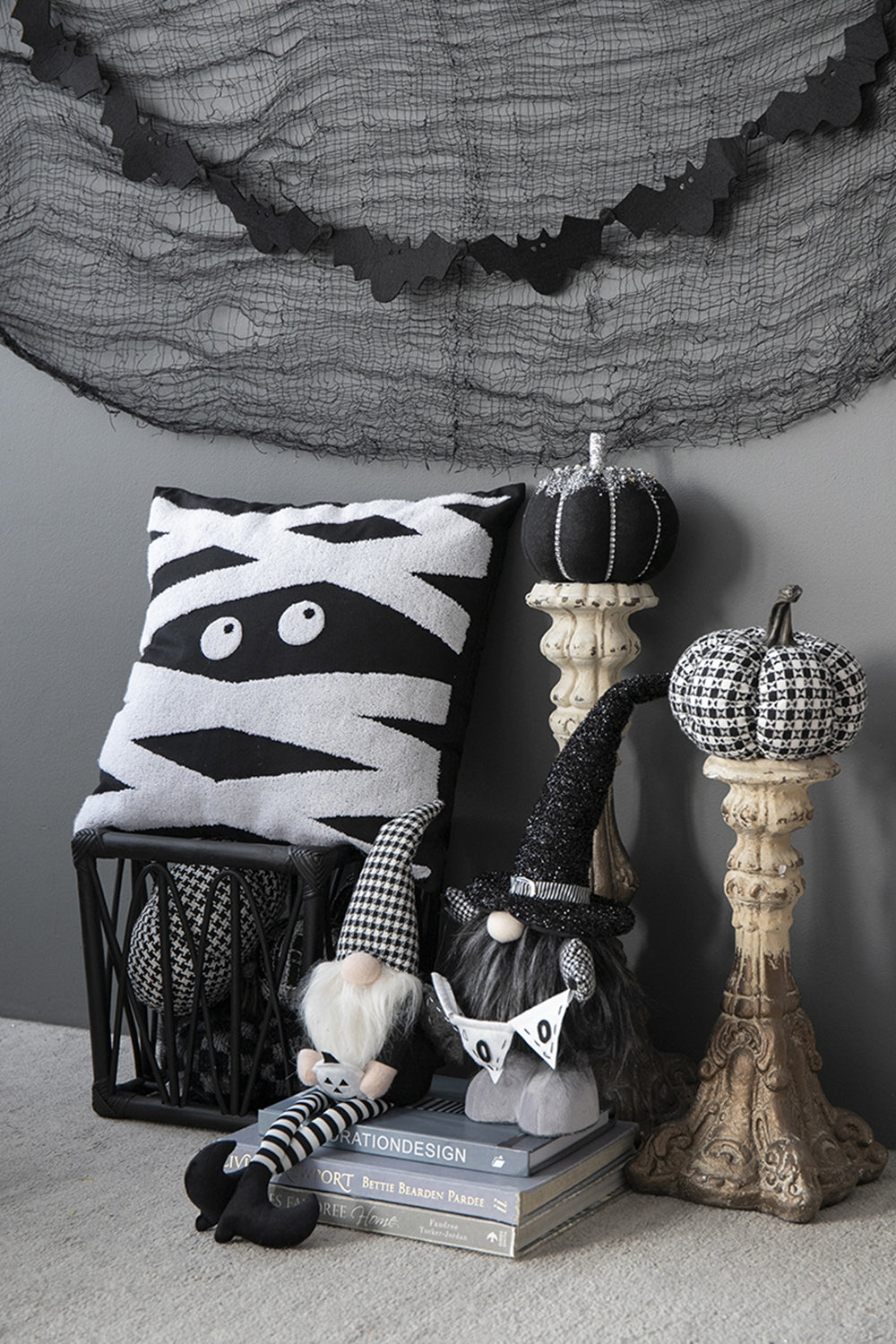 Black and white mummy pillow with googly eyes a fun Halloween decor piece