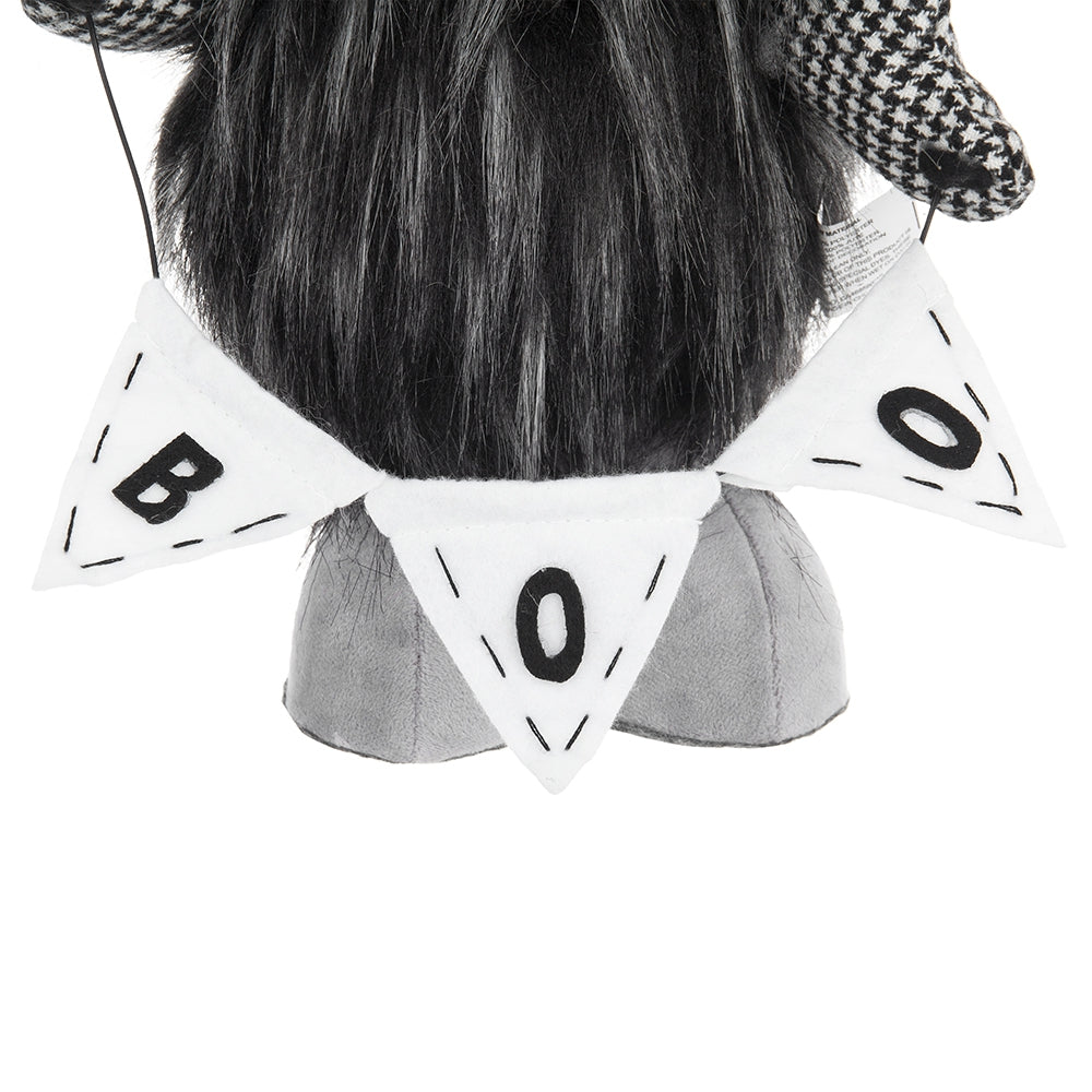 Halloween gnome with BOO banner decoration for festive display