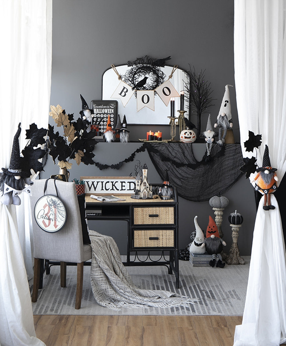 Cute Halloween gnome with orange hat and black beard on shelf