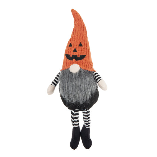 Halloween gnome with pumpkin face hat and striped socks