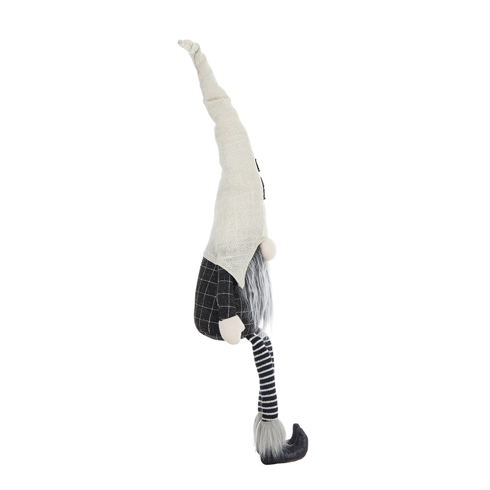 Black and white plaid gnome with long hat and fuzzy tail perfect for holiday decor