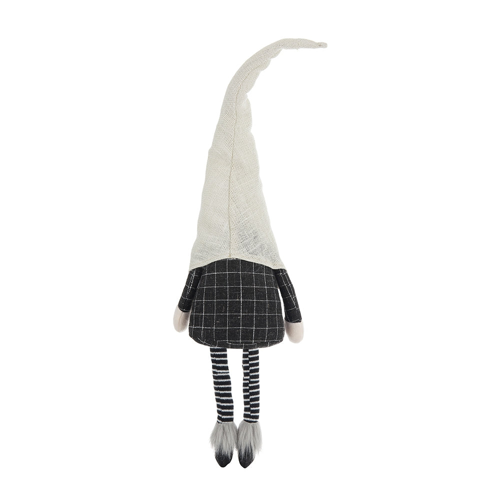 Textile gnome with a tall creamcolored pointed hat and black plaid tunic