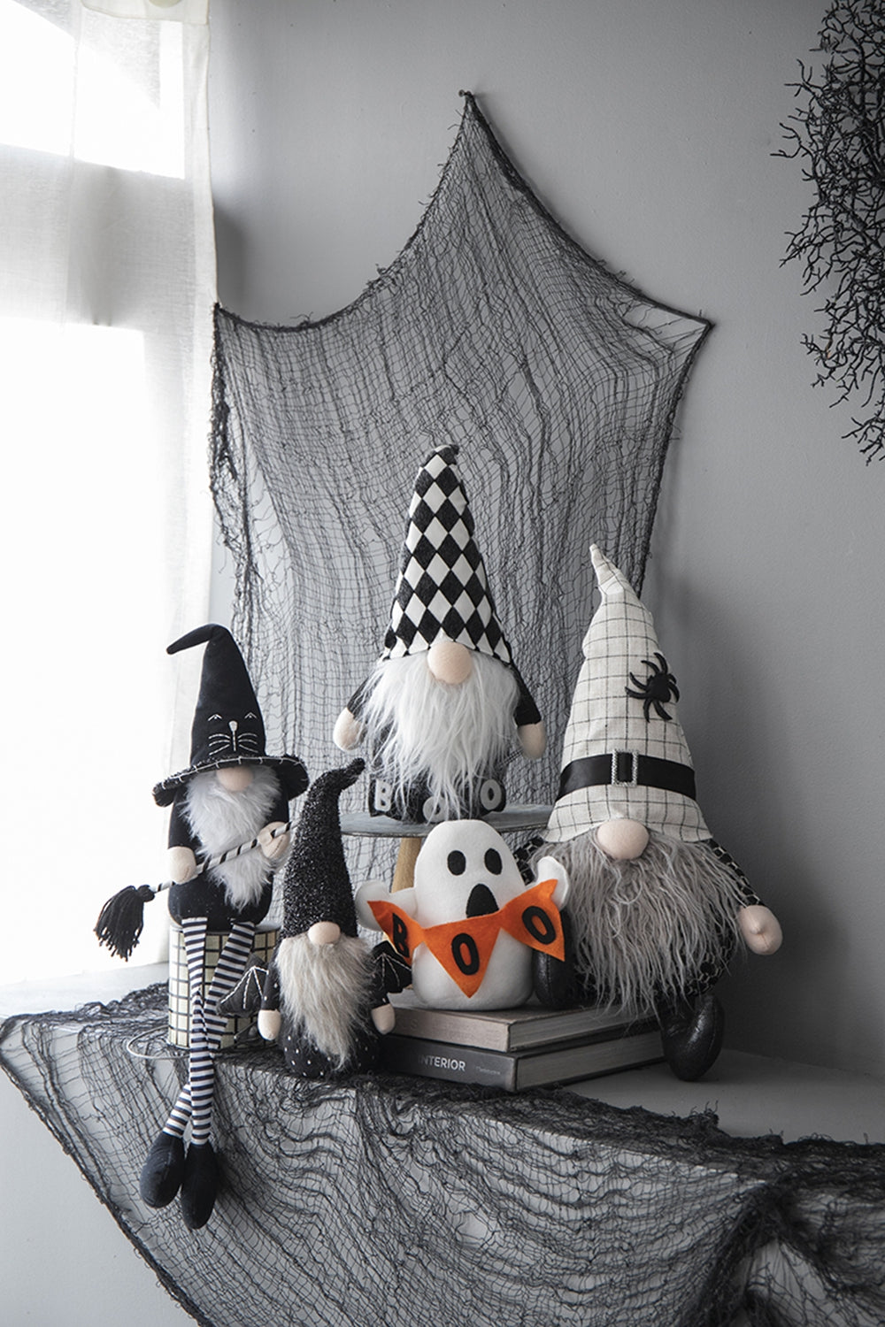Black and white checkered Halloween gnome with long beard perfect for spooky decor