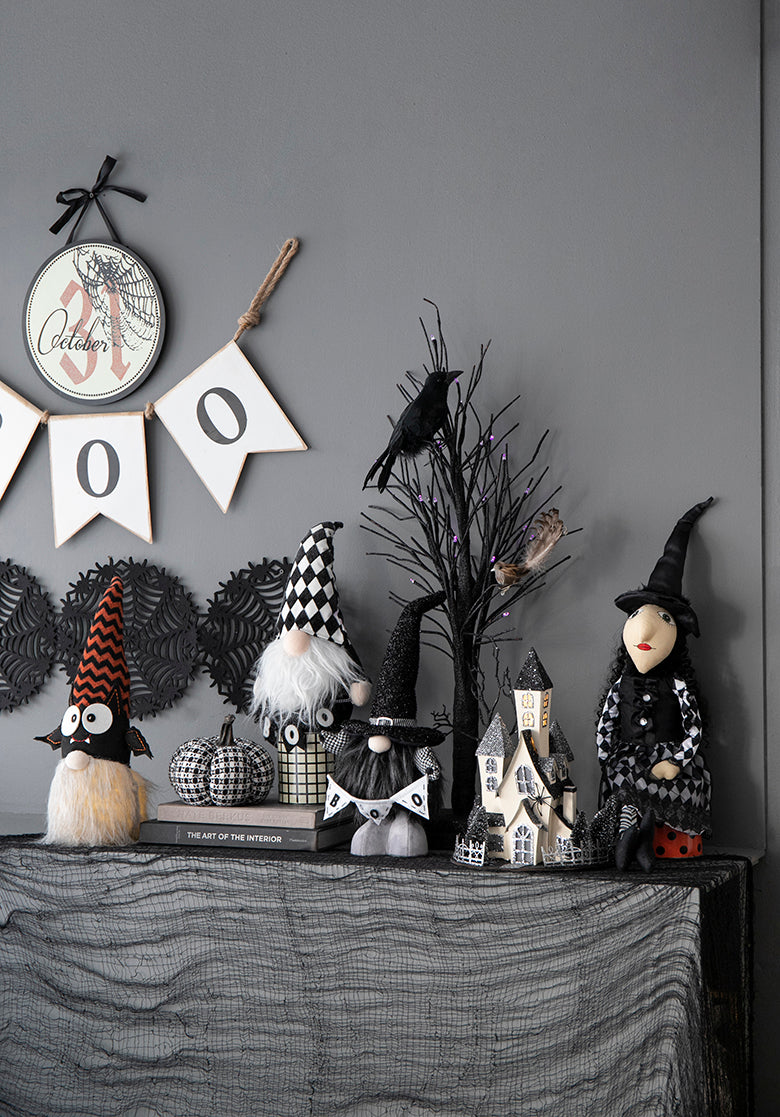 Halloween gnome with orange striped hat and bat wings festive decor