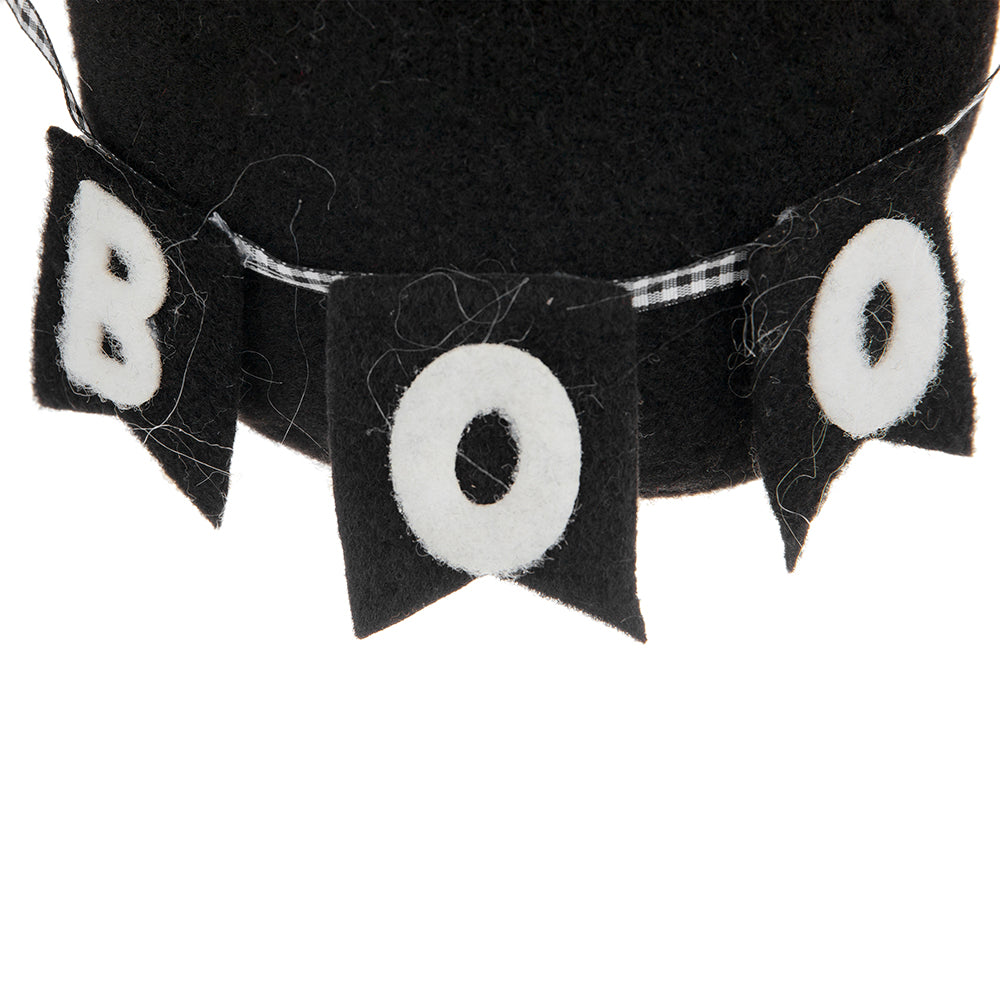 Black felt Halloween banner with white letters spelling BOO