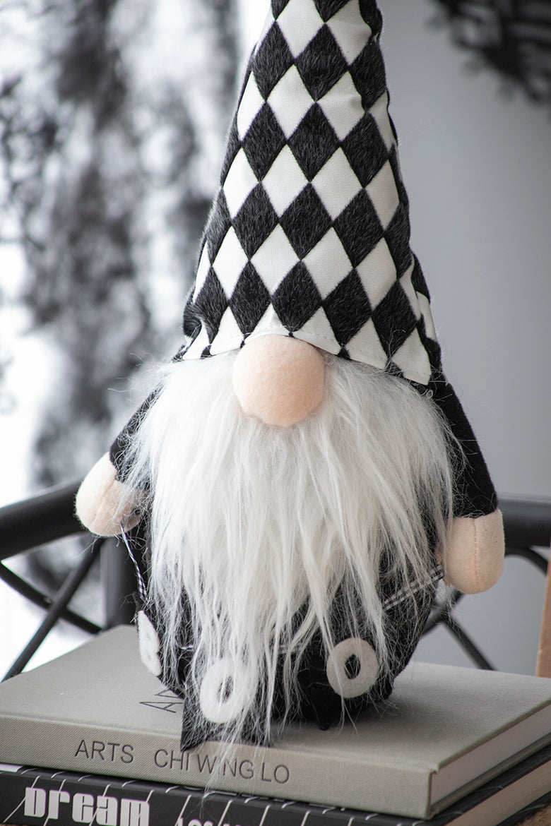 Black and white checkered gnome with long white beard