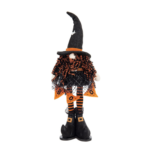 Textile Halloween gnome with orange and black hair wearing a witch hat and striped stockings