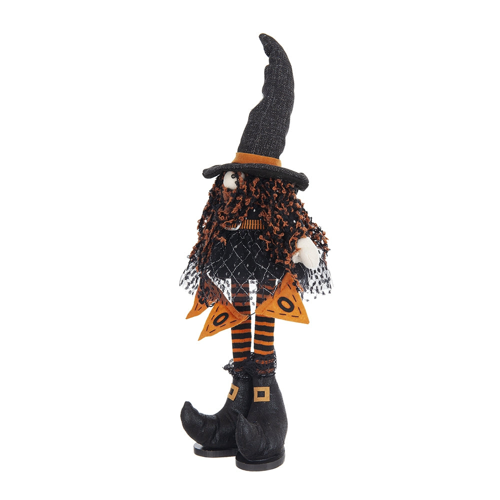 Halloween witch figurine with black hat orangestriped legs and pointed boots