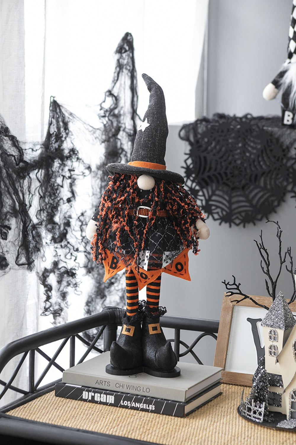 Halloween gnome with witch hat orange fuzzy hair and striped socks